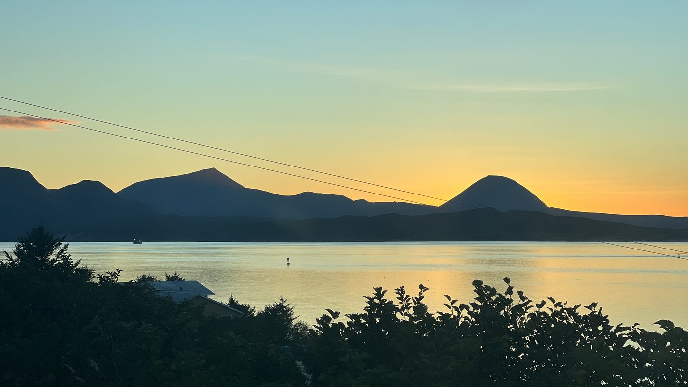 Sunset over the water at Sand Point